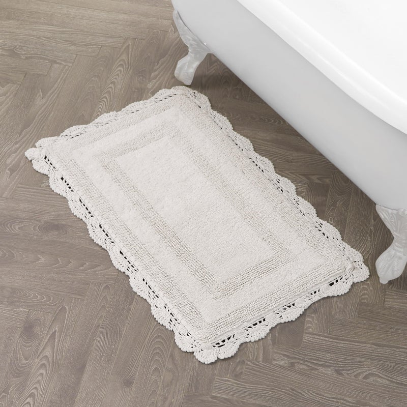 Laura Ashley Absorbent Bath Mat Reversible Crochet Soft and Plush Bathroom Mat 100% Cotton21x34 Bath Rug, Ivory - Image 1